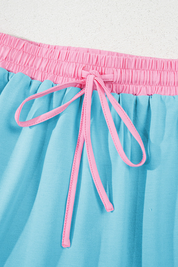 Conjunto de 2 piezas de camiseta y falda pantalón con hombros caídos y borde en bloques de color turquesa