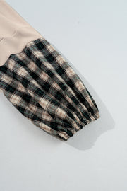 Mini-robe noire en maille gaufrée à carreaux, col en V, grande taille