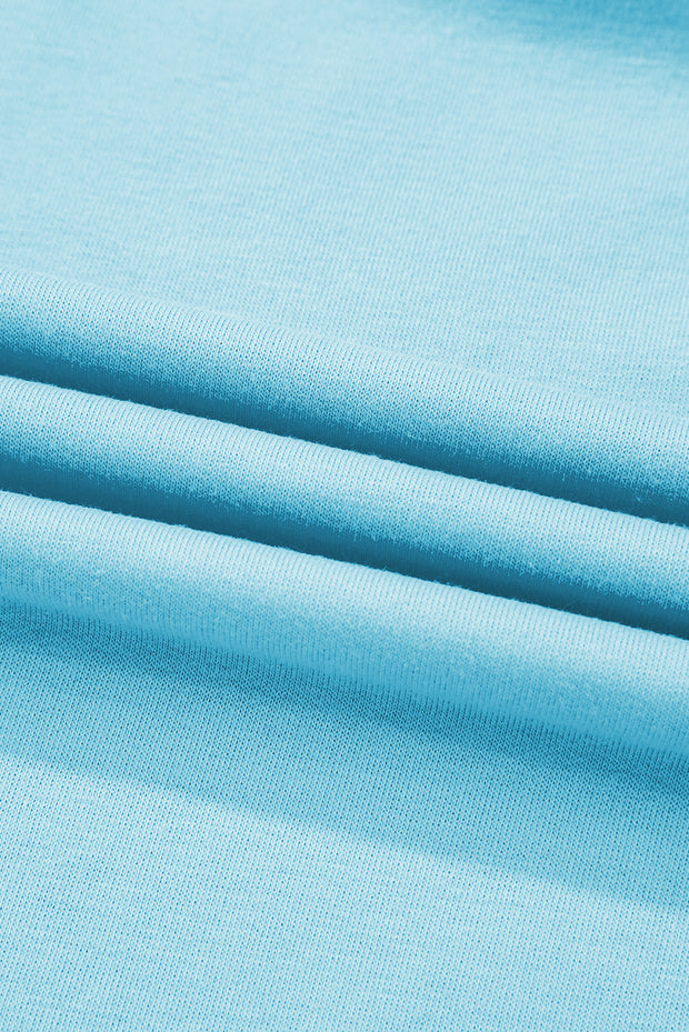 Conjunto de 2 piezas de camiseta y falda pantalón con hombros caídos y borde en bloques de color turquesa