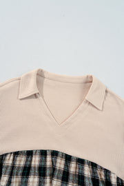 Mini-robe noire en maille gaufrée à carreaux, col en V, grande taille