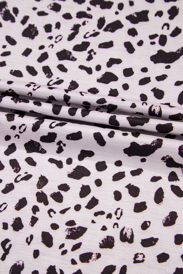 Camiseta de manga corta con cuello redondo y estampado de guepardo color albaricoque