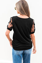 Camiseta de cuello redondo con patchwork de encaje floral negro