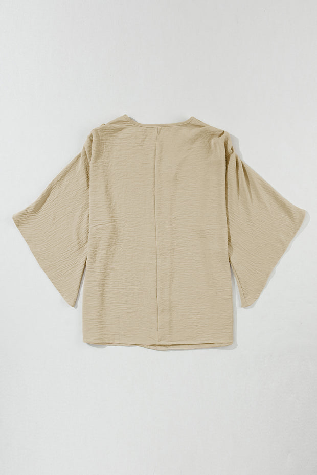 Parchment Solid V Neck Wide Sleeve Crinkled Blouse