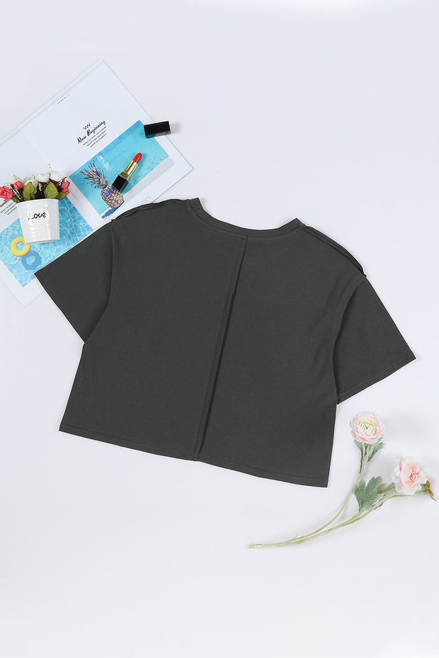 Camiseta gráfica de moda occidental gris CONFIAMOS EN DOLLY