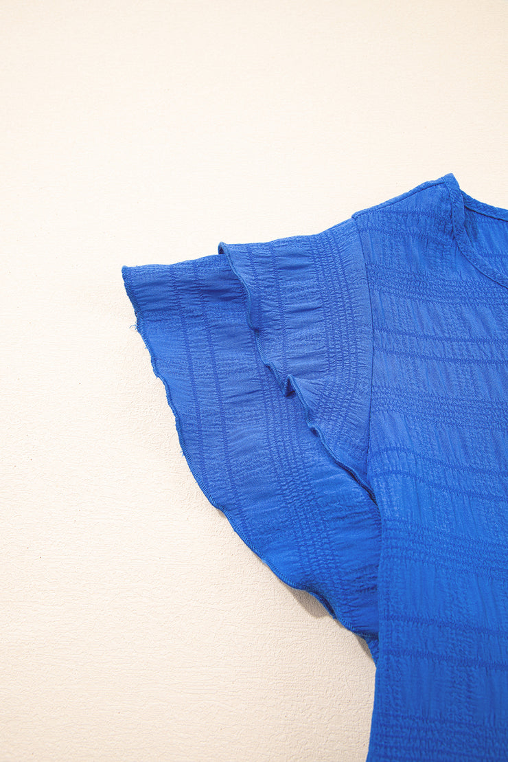 Top azul oscuro texturizado con mangas fruncidas y cuello redondo