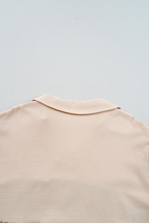 Mini-robe noire en maille gaufrée à carreaux, col en V, grande taille