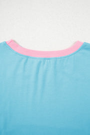 Conjunto de 2 piezas de camiseta y falda pantalón con hombros caídos y borde en bloques de color turquesa