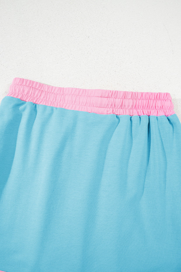 Conjunto de 2 piezas de camiseta y falda pantalón con hombros caídos y borde en bloques de color turquesa