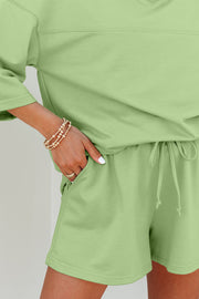 Meadow Mist Green Solid Loose V Neck Half Sleeve Tee and Shorts