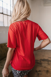 Camiseta holgada vaquera con gráfico "Llévame lejos" en color rojo tomate